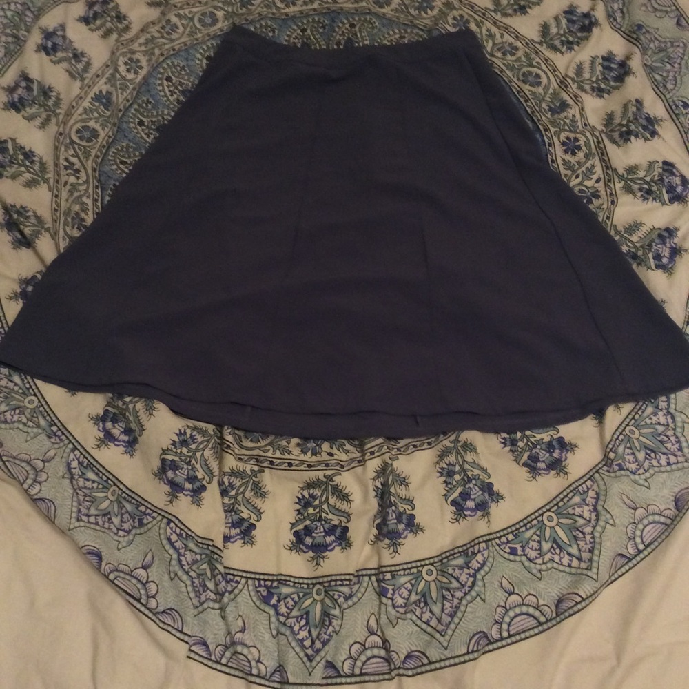 Light purple, modest skirt.